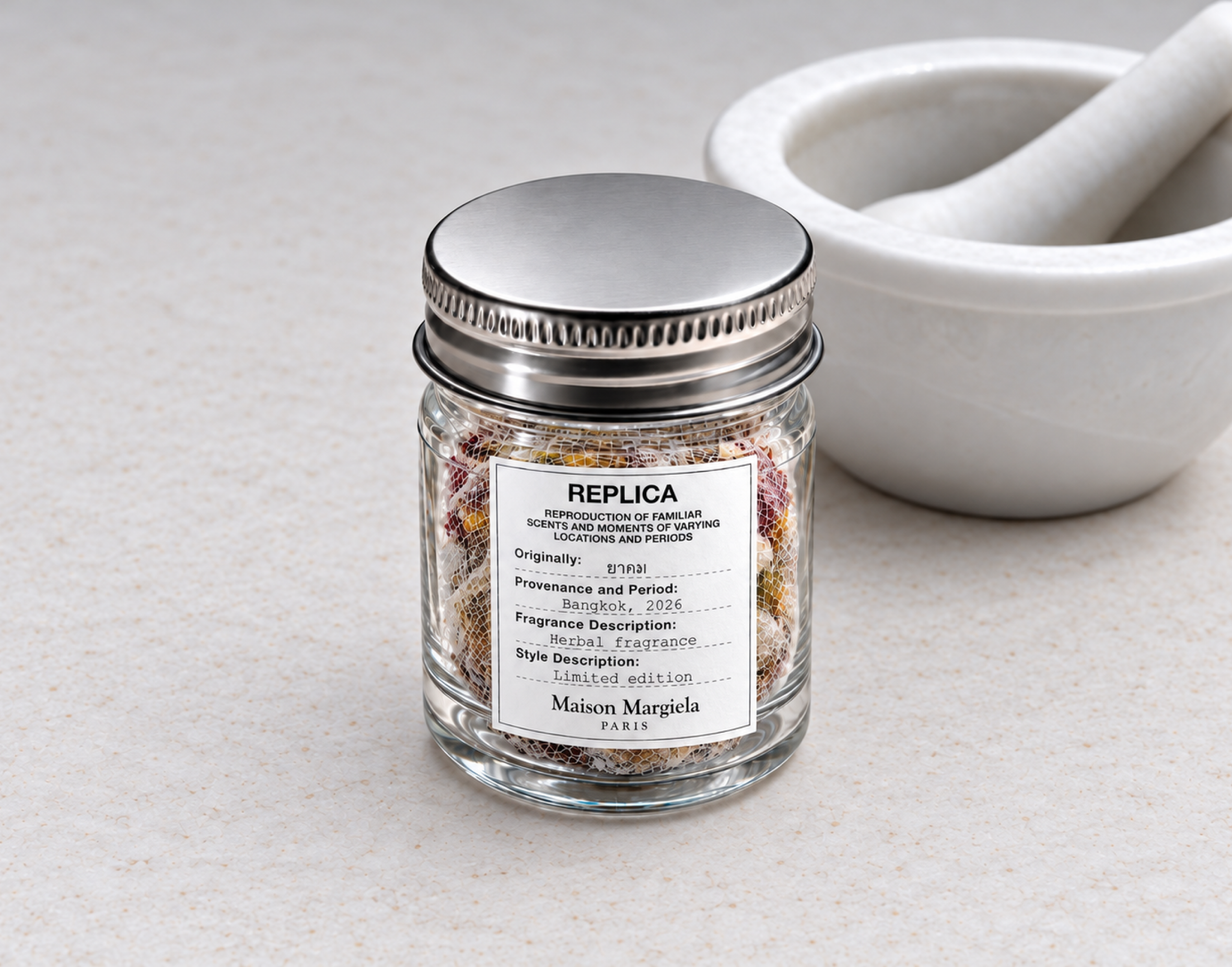REPLICA fragrance jar beside a white mortar and pestle